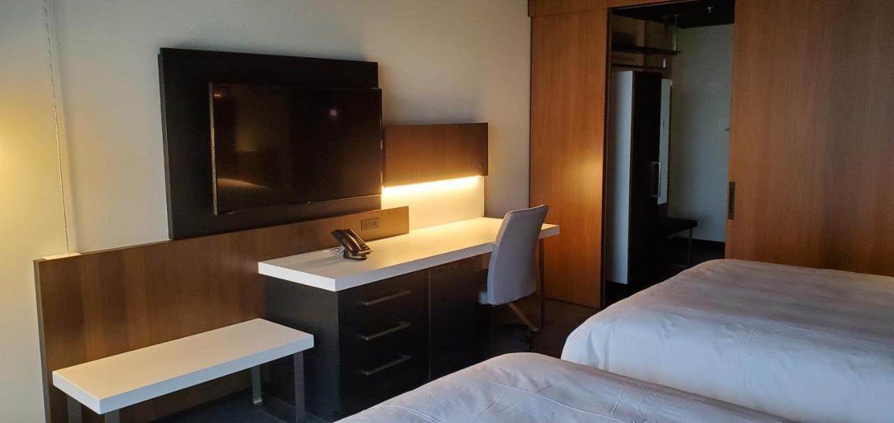 Grand Times Hotel Laval - Centropolis Esterno foto