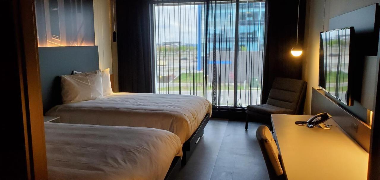 Grand Times Hotel Laval - Centropolis Esterno foto