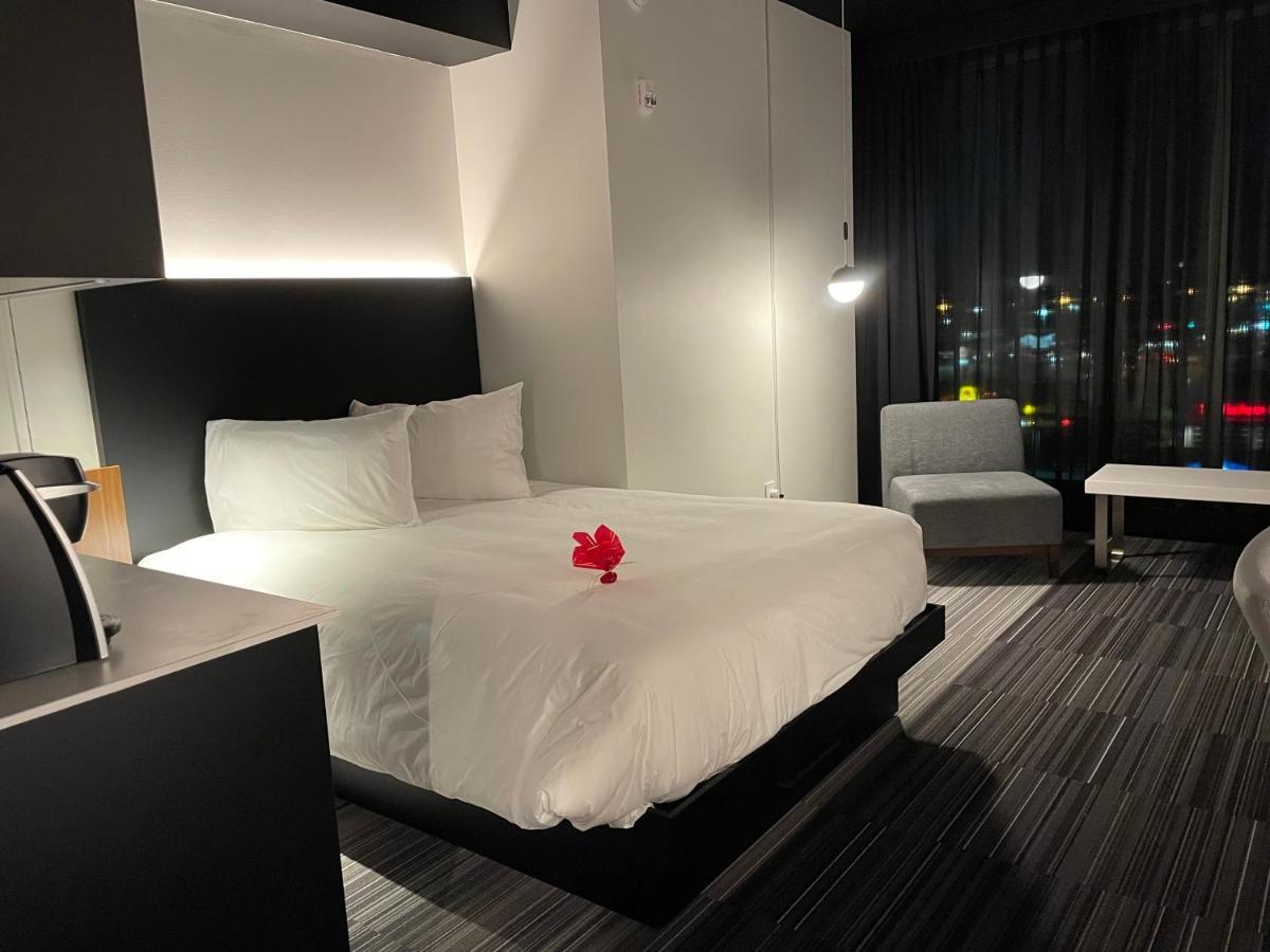 Grand Times Hotel Laval - Centropolis Esterno foto